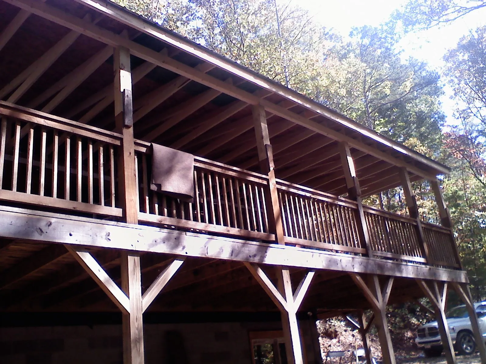 Timber framing under a new elevated porch and deck — Roof Leak Repair in Cedar City by Roofing Brothers